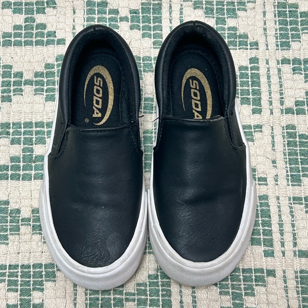 Black slip on sneakers